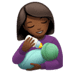 👩🏾‍🍼 woman feeding baby: medium-dark skin tone display on Apple